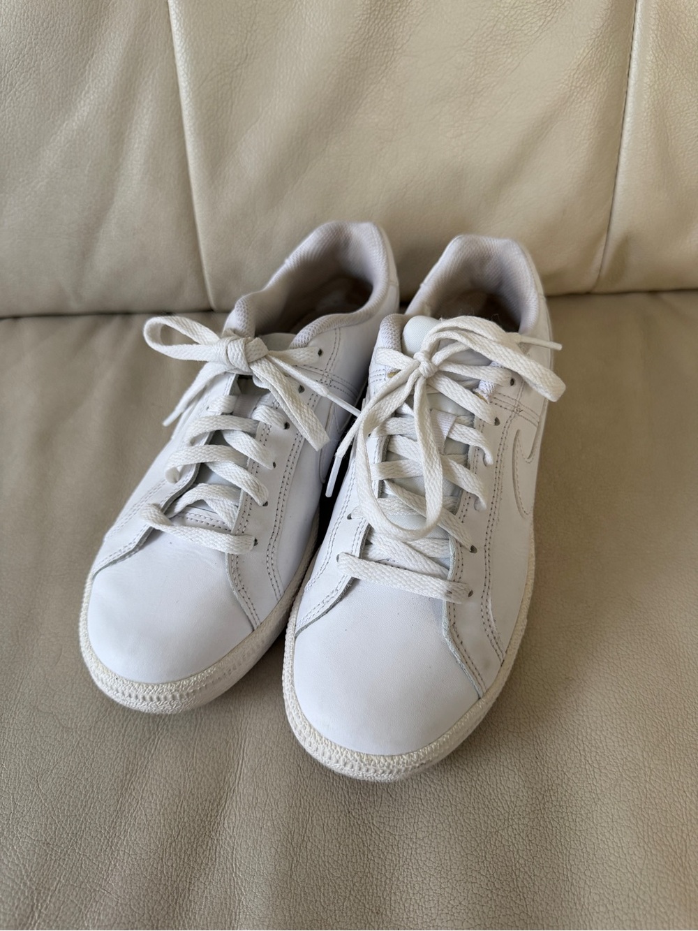Nike Court Royale low-top sneaker in a triple white leather colorway